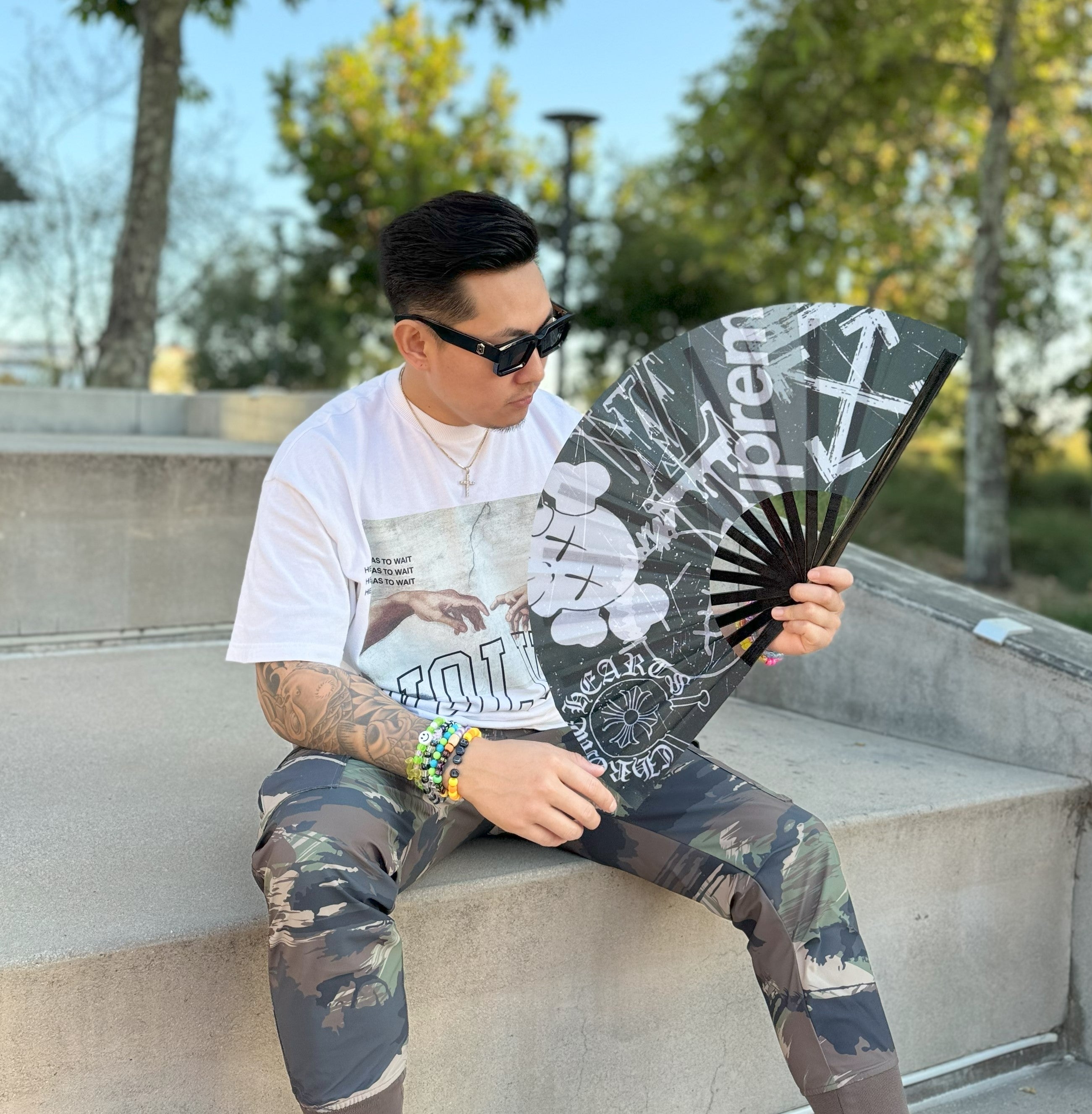 Male model With Couture Hypebeast Rave and Festival Hand Fan